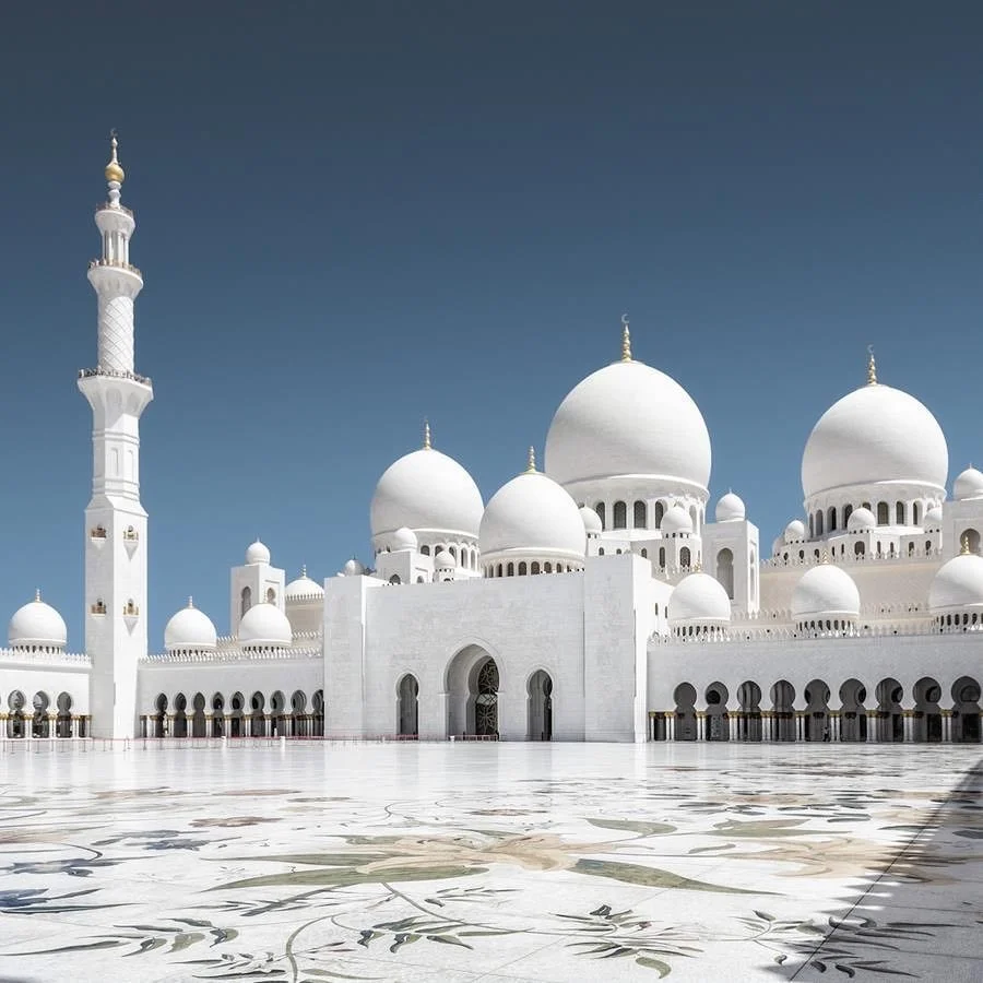 The white marble domes and minarets of the Sheikh Zayed Grand Mosque, Abu Dhabi